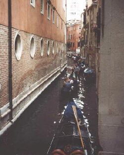 gondolas on a narrow canal
